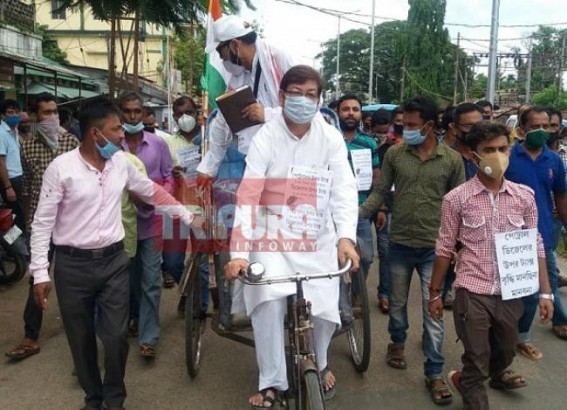 Birjit Sinha drives Rickshaw in protest against Petrol, Diesel Price hikes